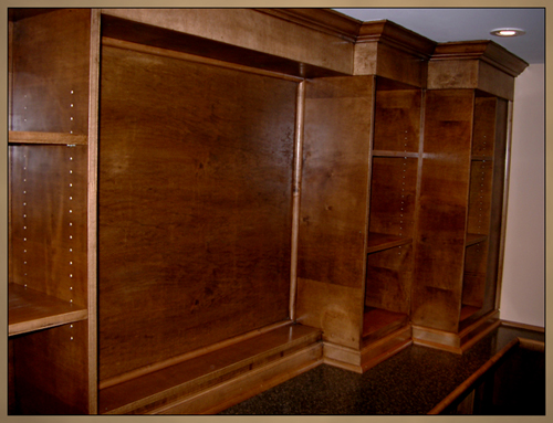 Photo of solid maple wood moulding including crown moulding, baseboards, quarter round and various custom made pieces